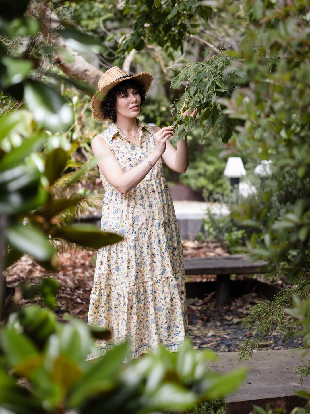 Batik Midi Dress Putri model wearing a summer hat